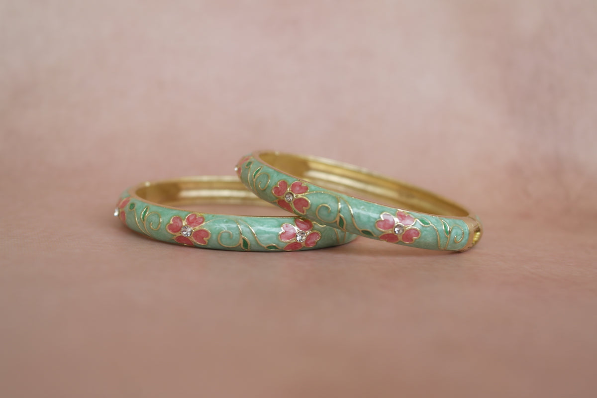 Gul Firoza enamel bangle by Rangat — pink blossoms unfold over firoza enamel