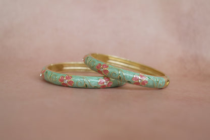 Gul Firoza enamel bangle by Rangat — pink blossoms unfold over firoza enamel