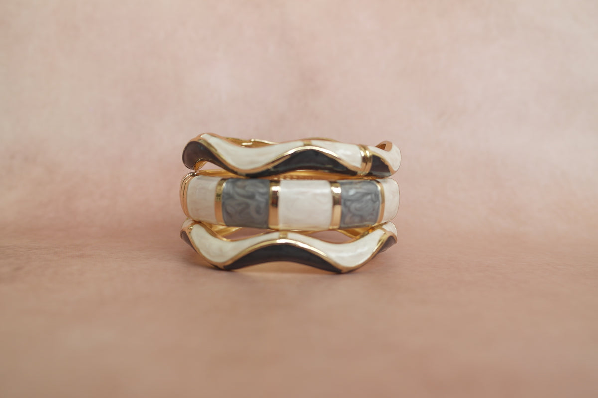 Saanjh Stack enamel bangle by Rangat — three neutral-toned bangles in ivory
