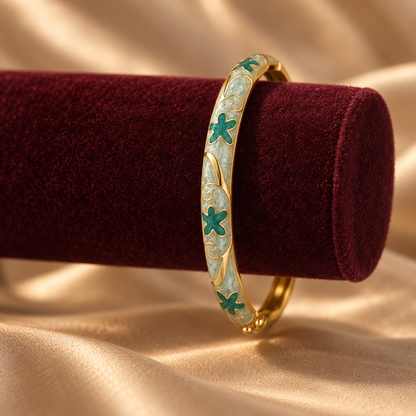 Hari Bel enamel bangle by Rangat — velvet display