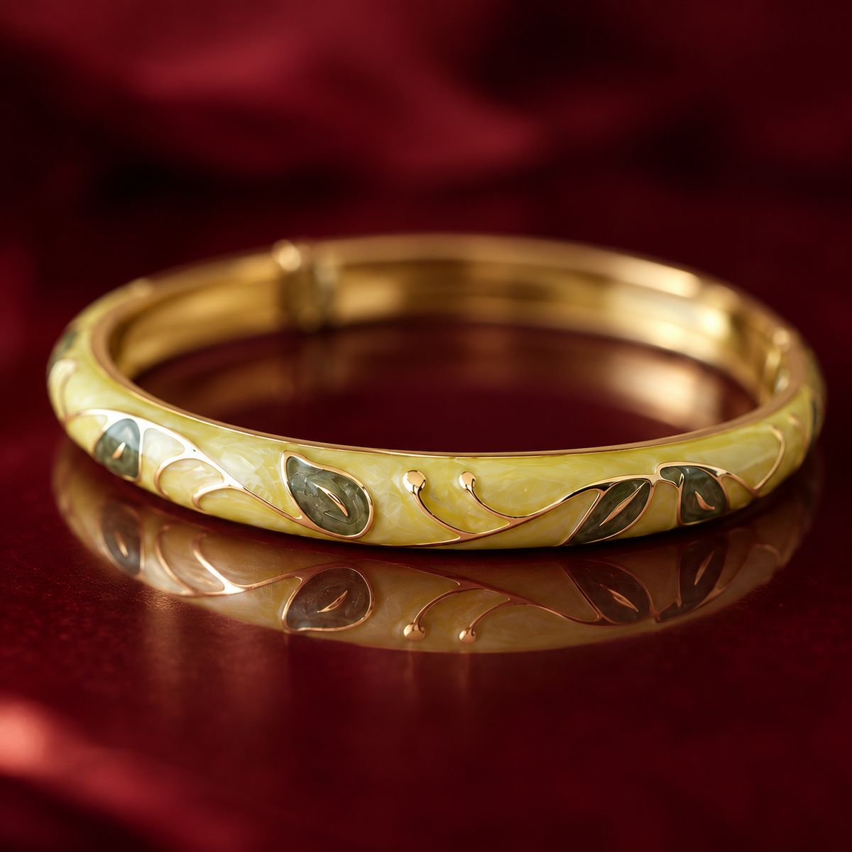 Harit Bela enamel bangle on burgundy reflective surface